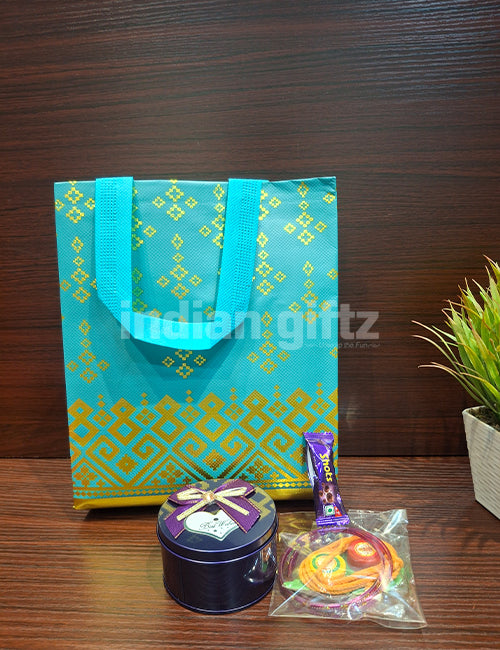 Non Woven Gift Bag with Round Tin Thambullam Set