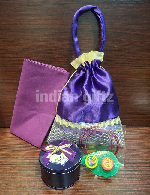 Designer Potli Bag with Round Tin Blouse Thambullam Set