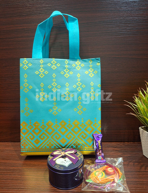 Non Woven Gift Bag with Round Tin Thambullam Set