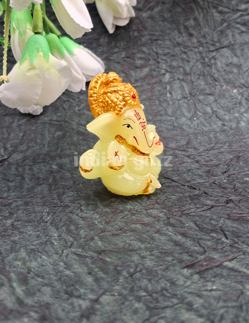 Glow-Effect Ganpati Murti  Illuminated Ganesha Idol with Elegant Gold Touch  Perfect for Home Décor, Workspaces & Car Dashboard