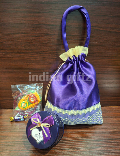 Designer Potli Bag with Round Tin Thambullam Set