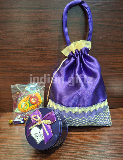 Designer Potli Bag with Round Tin Thambullam Set