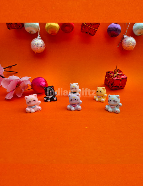 Cute Boy & Girl Love Sharing Hanging Legs Dolls – Polyresin Decorative Showpiece suitable for Tabletop Decoration Gifting, Home Decor, Table, Office Table